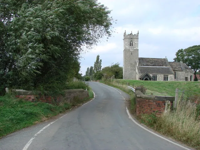 Old Eye Bridge, Birkin, with Birkin Church in the background.
