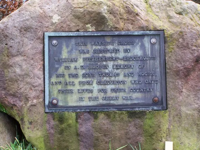 Plaque attached to the base of the cross at Claughton on Brock