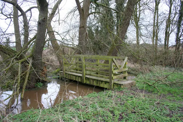 Footbridge over stream, near Poole Old Hall