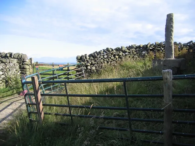 Gate and ancient cross at Weets Top