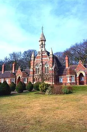 Hemsworth, Archbishop Holgate Almshouses, with the Chapel of  The Holy Cross.