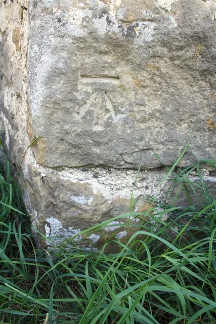 Benchmark on barn at Low Hall