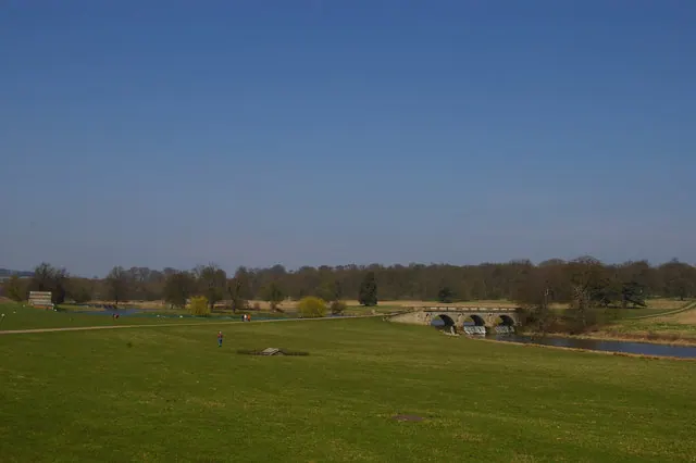 Kedleston Hall: parkland and ornamental bridge from the front of the Hall
