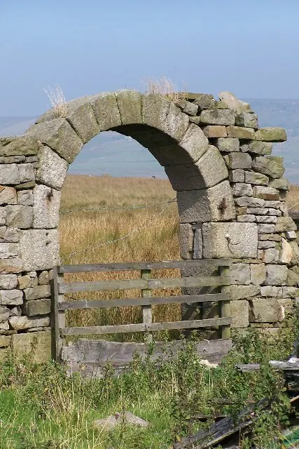 Remains of barn doorway and moorland