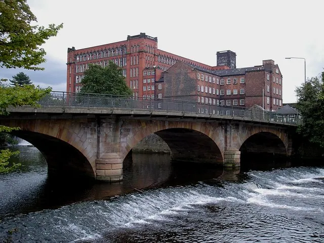 Belper - road bridge and North Mill from River Derwent path