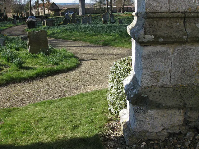 Cut bench mark, tower of All Saints church, Settrington