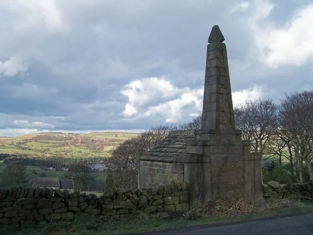 Memorial Obelisk with Agden Reservoir in background.
