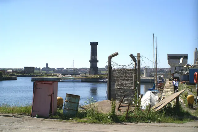 Across Collingwood and Salisbury Docks towards the Victoria Tower